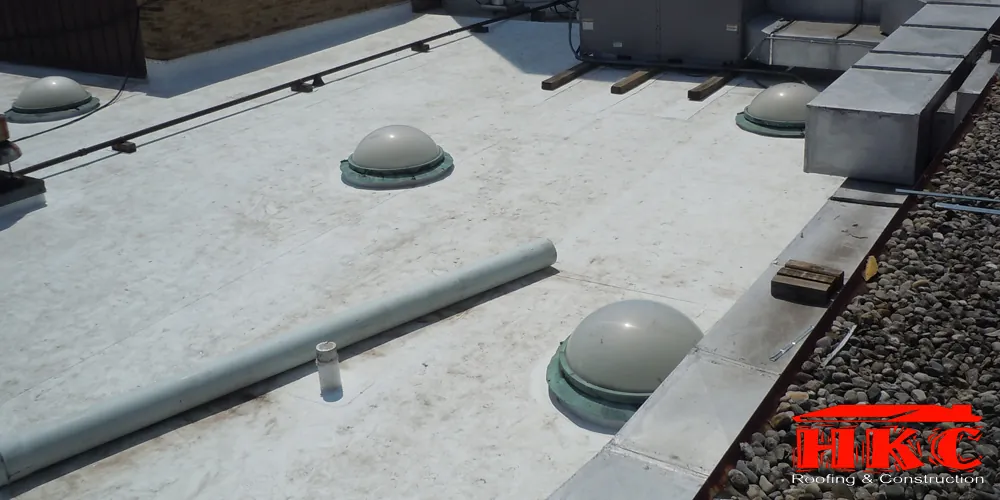 Flat roof with dome skylights, HKC Roofing & Construction